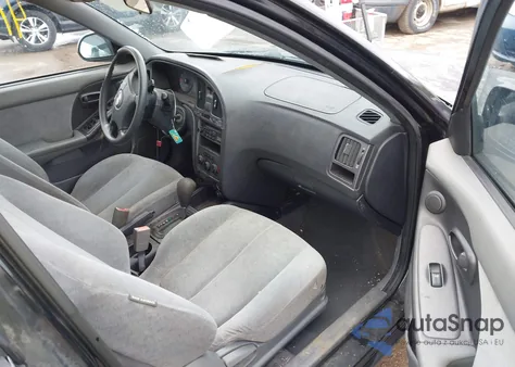 2004 Hyundai Elantra Gls/Gt z USA, uszkodzony, nr VIN KMHDN46D94U912026